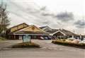 Swimmers evacuated from pool as roof rips in storm