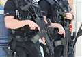 Armed police descend on village