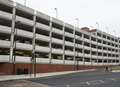 Man 'threatens to jump' from car park