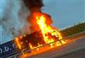 Lorry bursts into flames on roundabout approach