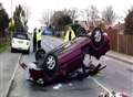 Traffic chaos after car overturns