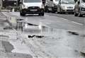 Main road floods after water leak