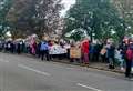 Heart-warming moment asylum seekers wave back at supporters