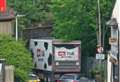 Lorry stuck under railway bridge