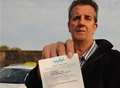 Hero who tackled armed robber handed parking fine