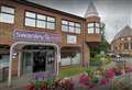 Car crashes into library