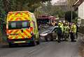 A-road shut after crash involving unmarked police car