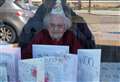 Family wish gran happy hundredth through window