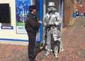 Statue and copper in high street 'stand-off'