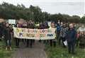 Protesters rally at protected marshland site