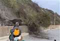 Dramatic moment tree plunges down cliff in another landslide