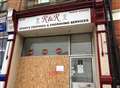 Table hurled through shop window