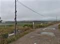 Fire crews rescue men trapped on island by rising tide