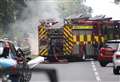 Firefighters deal with car fire