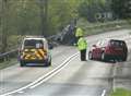 Woman flown to hospital after four-car pile-up closes road