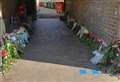 Tributes line alleyway after teen dies in stabbing