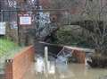 Supermarkets face fines as dumped trolleys risk floods