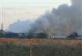 Wind blows industrial smoke over streets