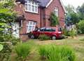 Driver veers off road and ploughs into house