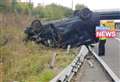 Van flips onto its roof in crash