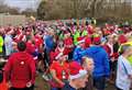 Thousands don Santa hats for Christmas Day runs