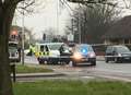 Man charged after armed police storm street