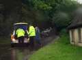 Road closed after car overturns