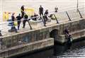 Police divers spotted in marina