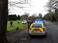 Car crashes through fence into field