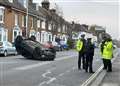 Car flips onto roof 