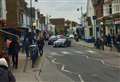 Four arrests after man and woman attacked in high street