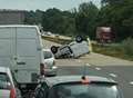 Overturned van on M20