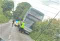 Passengers evacuated as double-decker bus lands in ditch