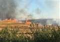 Massive fire consumes fields