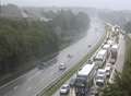 Traffic grinds to a halt on flooded roads