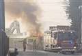 Firefighters call in reinforcements as they battle blaze at vehicle recycling centre