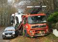 Man charged with drink driving after lorry crashes into car and wall