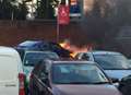 Car fireball at supermarket