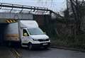 Krispy Kreme van gets wedged under bridge