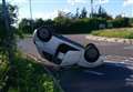 Car overturns in short cut attempt