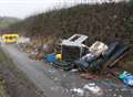 Dumped concrete and furniture blocks rural road