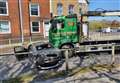 Car crushed by truck at busy roundabout