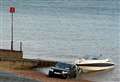 Driver’s nightmare as car swallowed by incoming tide