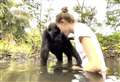 Daughter of Howletts boss pictured with gorillas in river