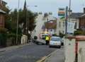 Road closed after car flips