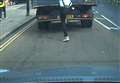 Shocking footage captures youths hitching lift on truck