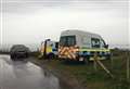 Police called to cliff top after boat lands on beach