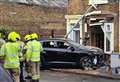 Car smashes into house