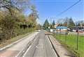 Crash between car and pedestrian blocks busy road