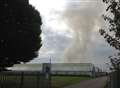 Firefighters remain at greenhouse blaze